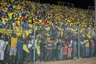 Fans celebrate at the Lucas Masterpieces Moripe Stadium.