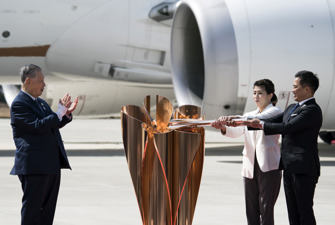 Lighting the olympic flame