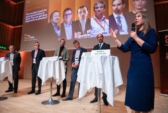 Panellists on a stage