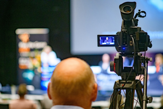 Man operating TV camera