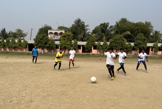 Girls playing football