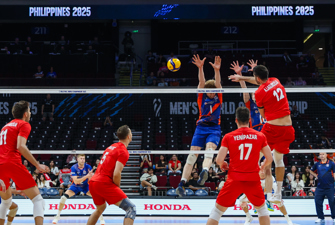 Men playing volleyball